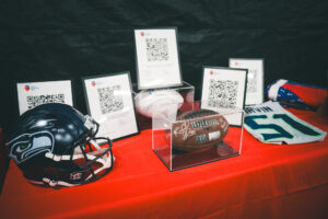 Signed football and seahawks helmet at a private pickleball event at side out tsunami seattle